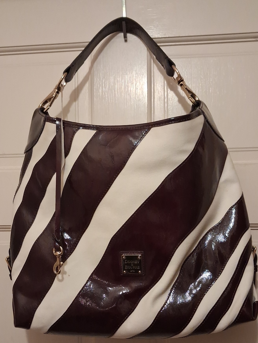 Dooney & Bourke Purple and White Striped Hobo Bag.